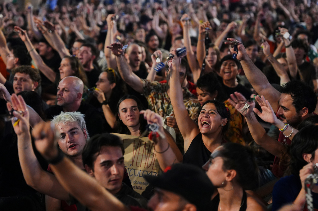 People gather during a protest following the eviction last Wednesday of 87-year-old Maricarmen to demand stronger laws to protect renters at Sol square in Madrid, Spain, Saturday, Sept. 26, 2026. (AP Photo/Manu Fernandez)