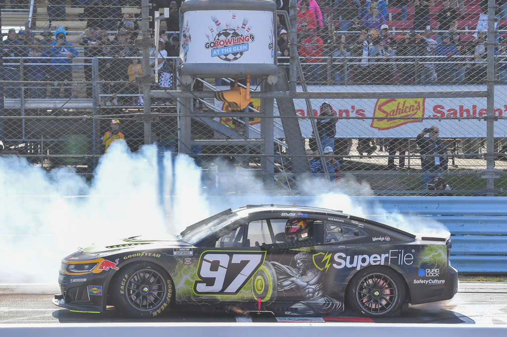 Shane Van Gisbergen does a burn out after winning a NASCAR Cup Series auto race, Sunday, May 10, 2026, in Watkins Glen, N.Y. (Photo/Adrian Kraus)
