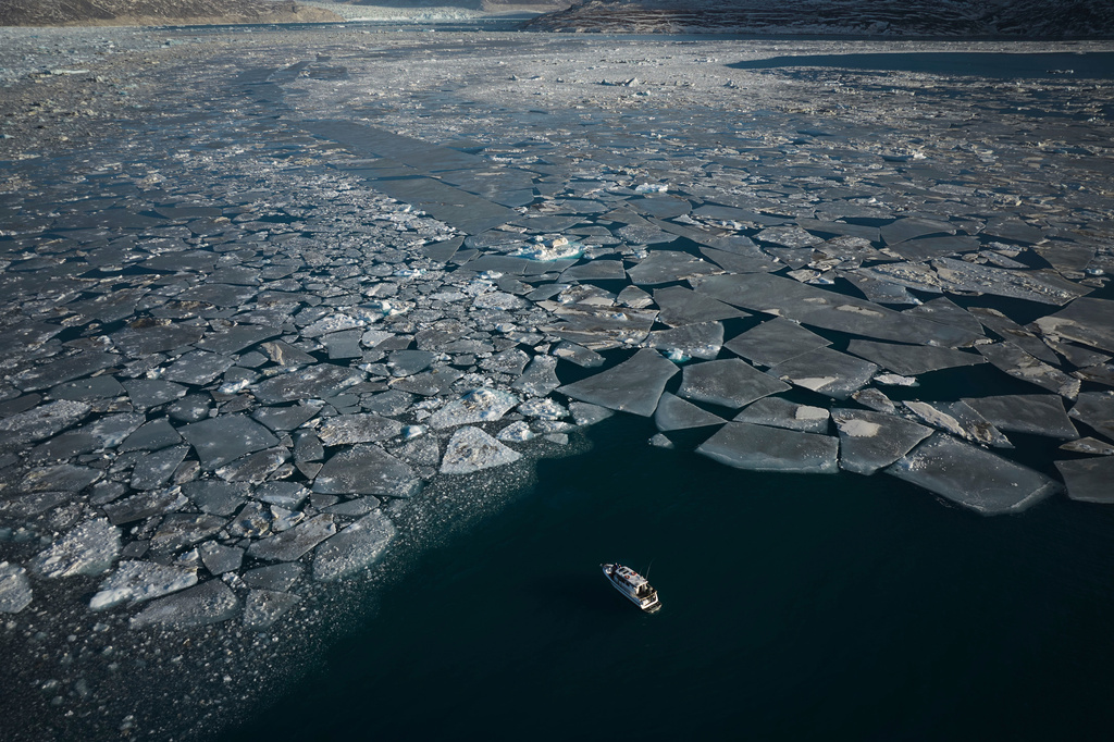 FILE - Pieces of ice move through the sea in Qoornoq Island, near Nuuk, Greenland, Feb. 17, 2025. (AP Photo/Emilio Morenatti, File)