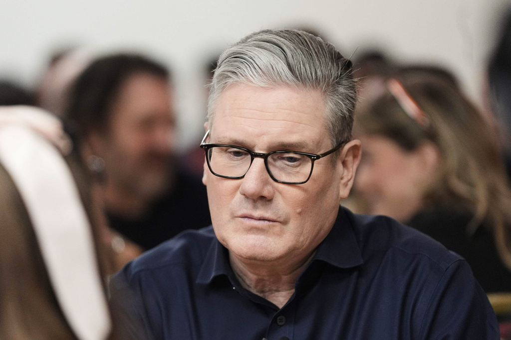 Britain's Prime Minister Keir Starmer meets local party members, in London, Friday, Feb. 27, 2026. (Stefan Rousseau/PA via AP)