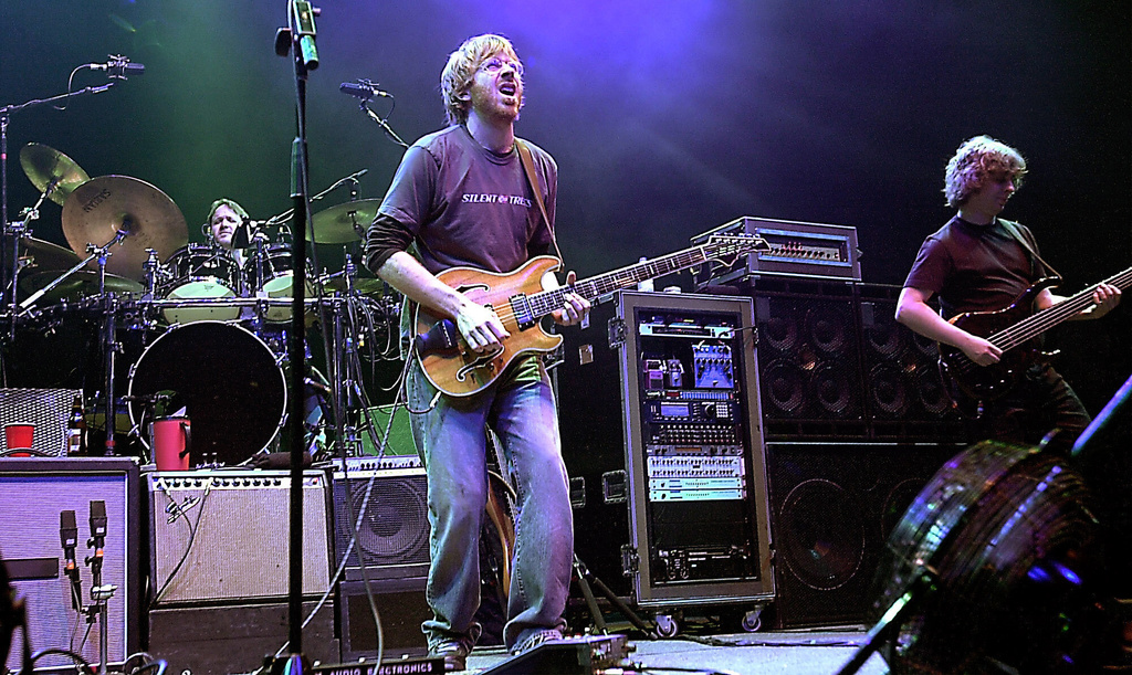 FILE - The group Phish, drummer Jon Fishman, guitarist Trey Anastasio, center, and bassist Mike Gordon, perform in this Dec. 31, 2002 file photo at New York's Madison Square Garden. (AP Photo/Stephen Chernin, File)