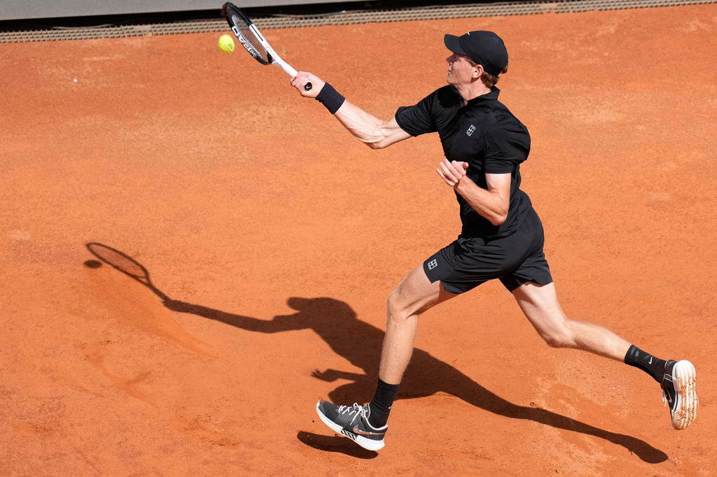 Italy's Jannik Sinner returns the ball to Italy's Andrea Pellegrino, during their match at the Italian Open tennis tournament in Rome, Tuesday, May 12, 2026. (AP Photo/Alessandra Tarantino)