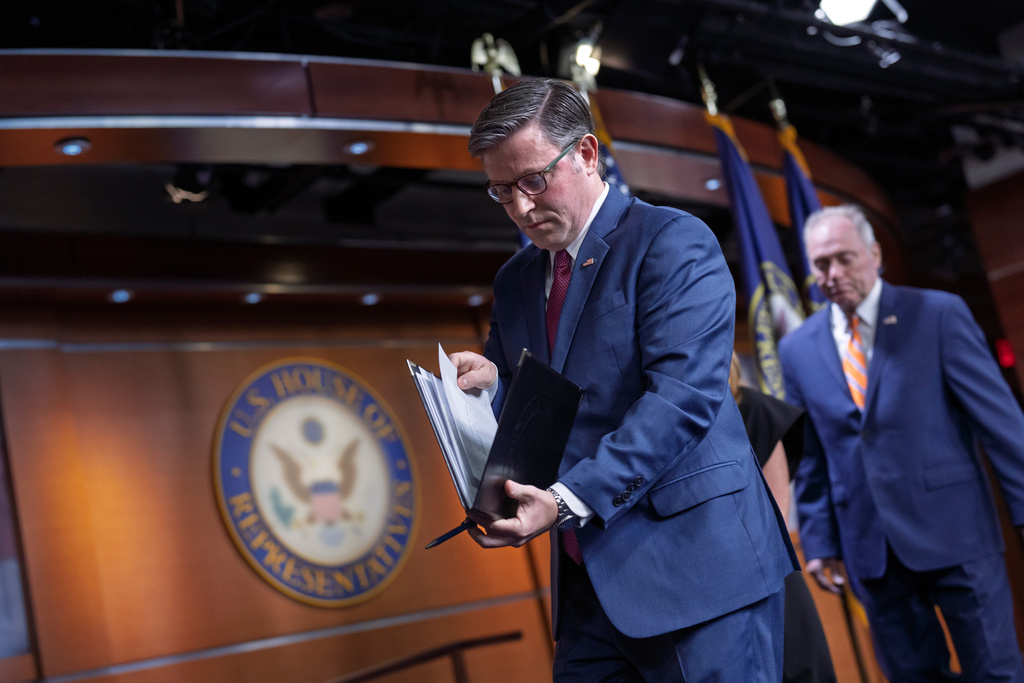 Speaker of the House Mike Johnson, R-La., followed by House Majority Leader Steve Scalise, R-La., departs after addressing reporters on day 17 of the government shutdown with no resolution in sight to the crisis, at the Capitol in Washington, Friday, Oct. 17, 2025. (AP Photo/J. Scott Applewhite)