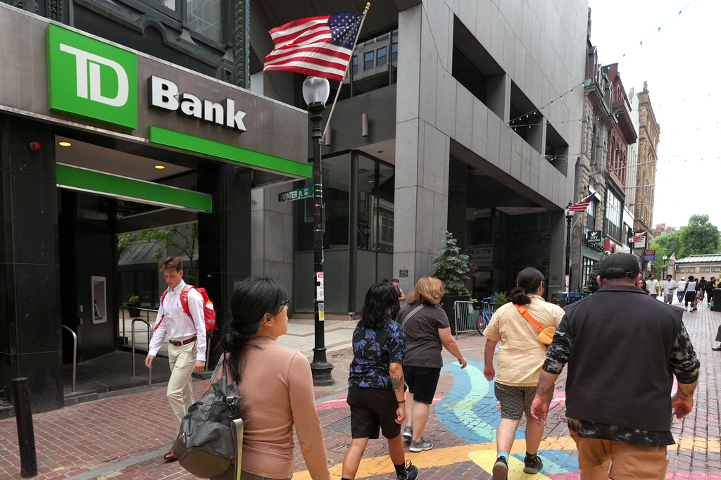 FILE - Pedestrians pass a TD Bank location, June 24, 2026, in Boston. (AP Photo/Charles Krupa, File)