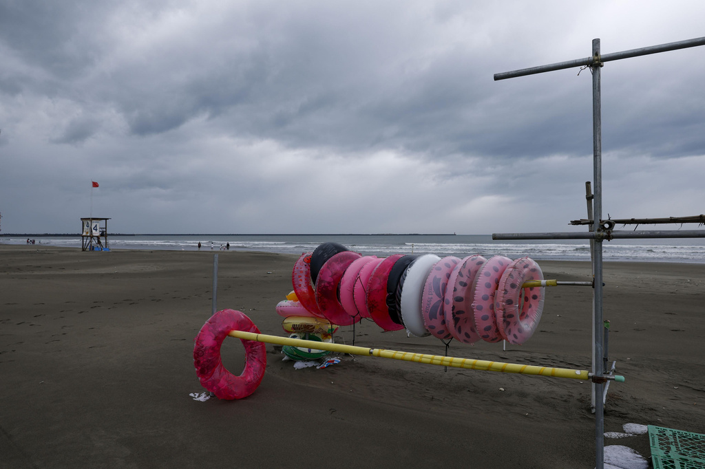 A beach is closed to swimmers due to the effects of Tropical Storm Chan-hom in Oarai, Ibaraki prefecture, Japan Tuesday, Aug. 11, 2026. (Kota Endo/Kyodo News via AP)