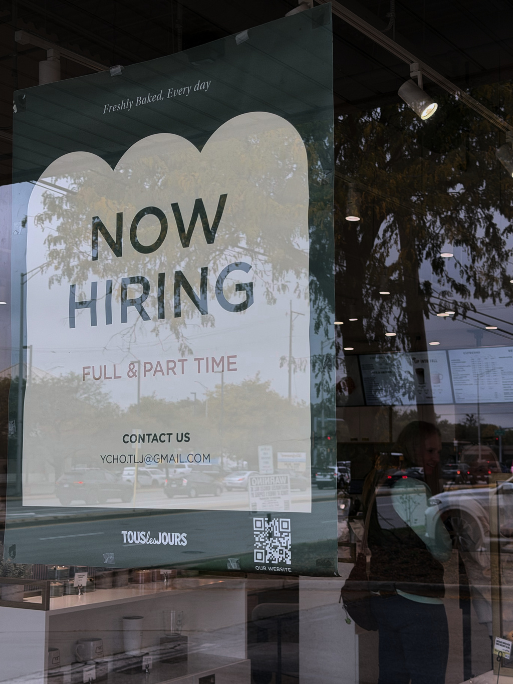 Hiring sign is displayed at a bakery in Arlington Heights, Ill., Wednesday, Sept. 30, 2026. (AP Photo/Nam Y. Huh)