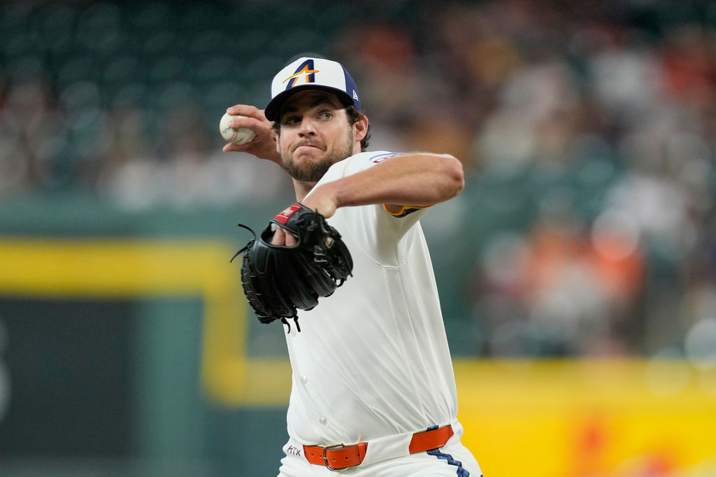 Houston Astros starting pitcher Peter Lambert (38) throws against the Seattle Mariners during the first inning of a baseball game Monday, May 11, 2026, in Houston. (AP Photo/David J. Phillip)