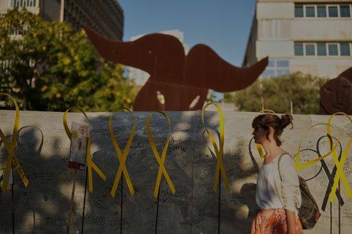 A person walks past an installation simulating a tunnel in Gaza in an act of solidarity with hostages believed to be held underground by Hamas during the Jewish holiday of Sukkot, at a plaza known as hostages square, in Tel Aviv, Israel, Friday, Oct. 10, 2025. (AP Photo/Francisco Seco) A person walks past an installation simulating a tunnel in Gaza in an act of solidarity with hostages believed to be held underground by Hamas during the Jewish holiday of Sukkot, at a plaza known as hostages square, in Tel Aviv, Israel, Friday, Oct. 10, 2025. (AP Photo/Francisco Seco)