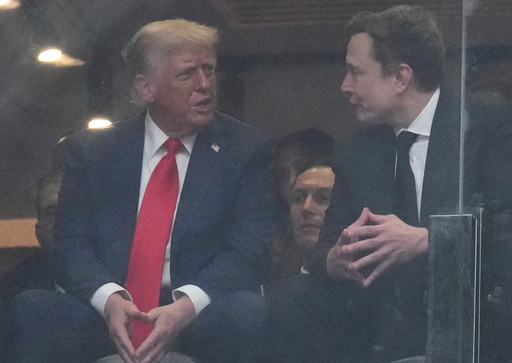 FILE - President Donald Trump, left, and Elon Musk talk during a memorial for Charlie Kirk, Sunday, Sept. 21, 2025, at State Farm Stadium in Glendale, Ariz. (AP Photo/Ross D. Franklin, File) FILE - President Donald Trump, left, and Elon Musk talk during a memorial for Charlie Kirk, Sunday, Sept. 21, 2025, at State Farm Stadium in Glendale, Ariz. (AP Photo/Ross D. Franklin, File)
