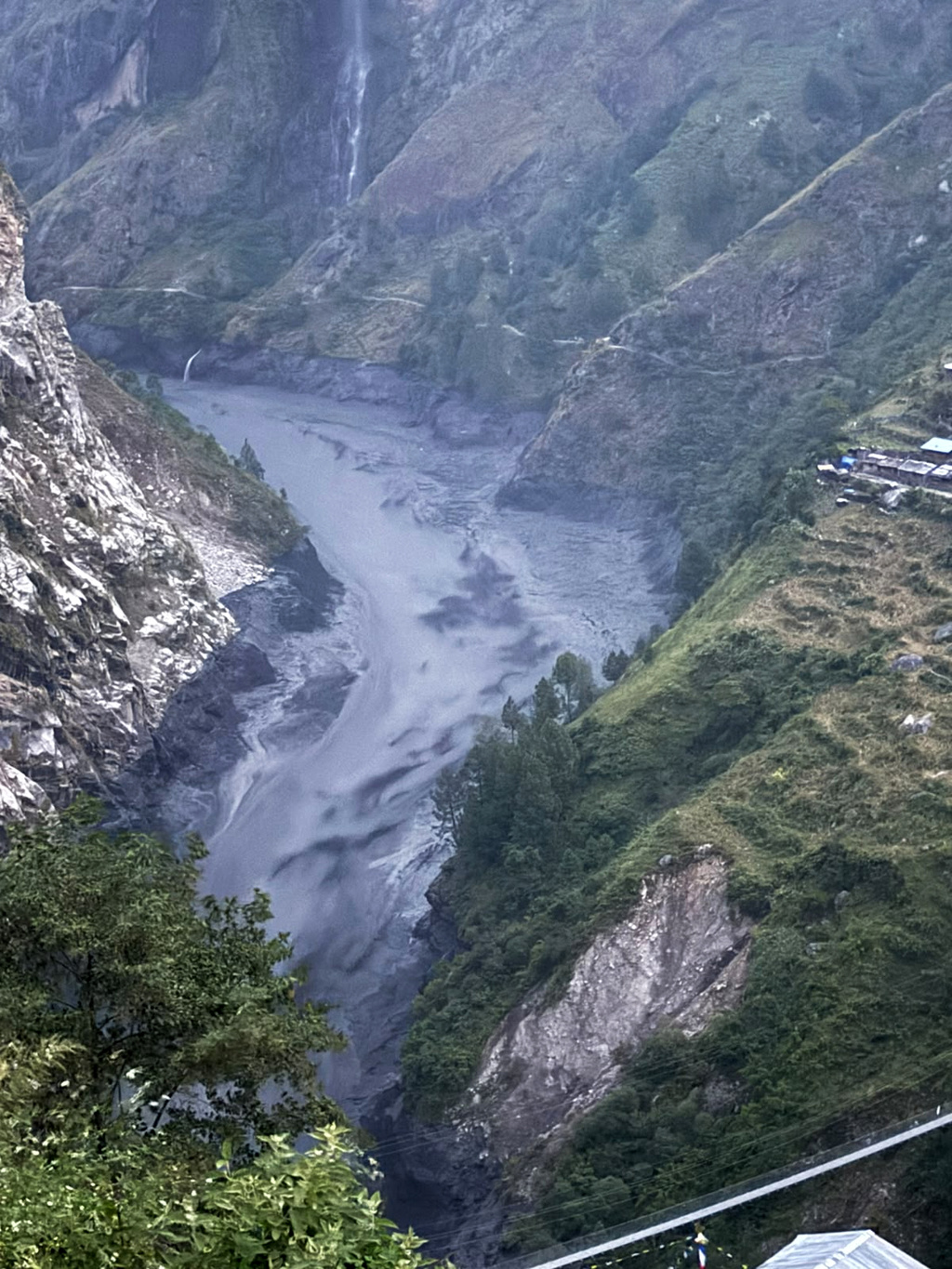 In this photo provided by the Nepal Army, Budhi Gandaki river in north central Nepal is seen in spate, Sunday, Oct. 11, 2026. (Nepal Army via AP)