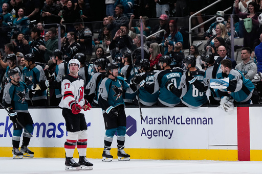 San Jose Sharks center Tyler Toffoli (73) celebrates with teammates after scoring during the second period of an NHL hockey game against the New Jersey Devils, Thursday, Oct. 30, 2025, in San Jose, Calif. (AP Photo/Godofredo A. Vásquez) San Jose Sharks center Tyler Toffoli (73) celebrates with teammates after scoring during the second period of an NHL hockey game against the New Jersey Devils, Thursday, Oct. 30, 2025, in San Jose, Calif. (AP Photo/Godofredo A. Vásquez)
