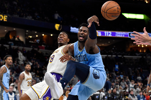 Memphis Grizzlies forward Jaren Jackson Jr., right, and Los Angeles Lakers forward Rui Hachimura (28) struggle for control of the ball in the second half of an NBA Cup basketball game Friday, Oct. 31, 2025, in Memphis, Tenn. (AP Photo/Brandon Dill) Memphis Grizzlies forward Jaren Jackson Jr., right, and Los Angeles Lakers forward Rui Hachimura (28) struggle for control of the ball in the second half of an NBA Cup basketball game Friday, Oct. 31, 2025, in Memphis, Tenn. (AP Photo/Brandon Dill)