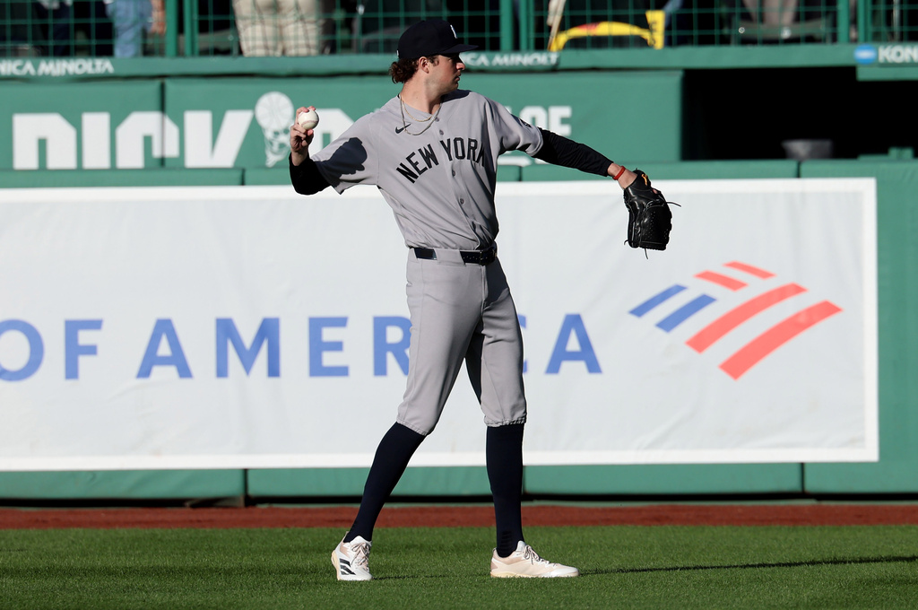 New York Yankees pitcher Cam Schlittler (31) warms up before a baseball game against the Boston Red Sox, Thursday, April 23, 2026, in Boston. (AP Photo/Mark Stockwell)