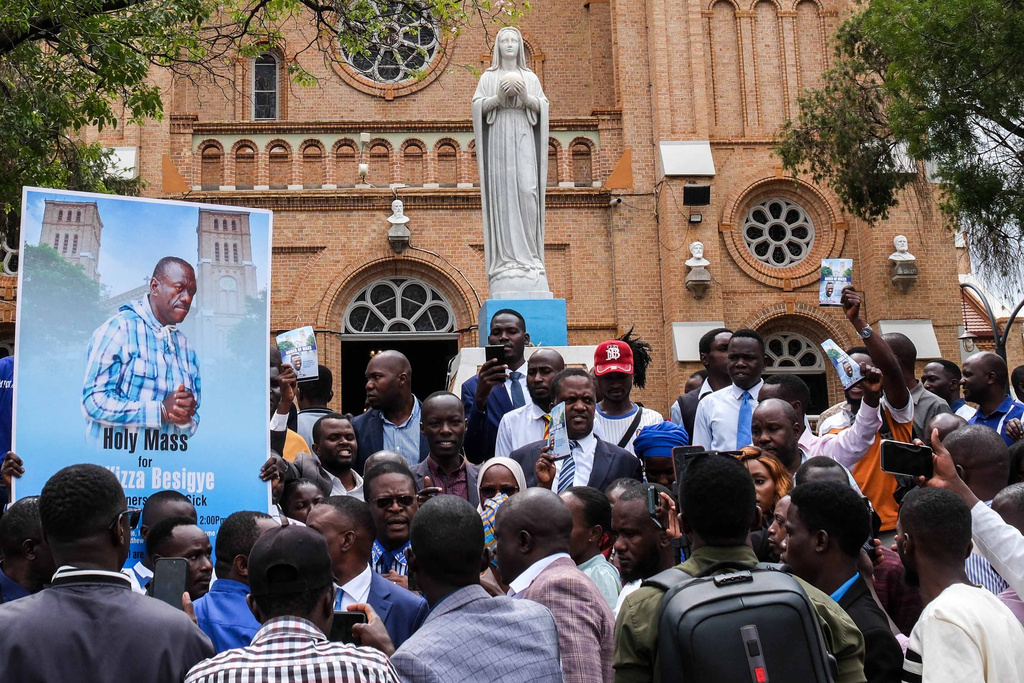 Supporters of detained Ugandan opposition figure Kizza Besigye gather for a prayer to press authorities to free him at Rubaga Cathedral in Kampala, Monday, Feb. 23, 2026. (AP Photo/Hajarah Nalwadda)