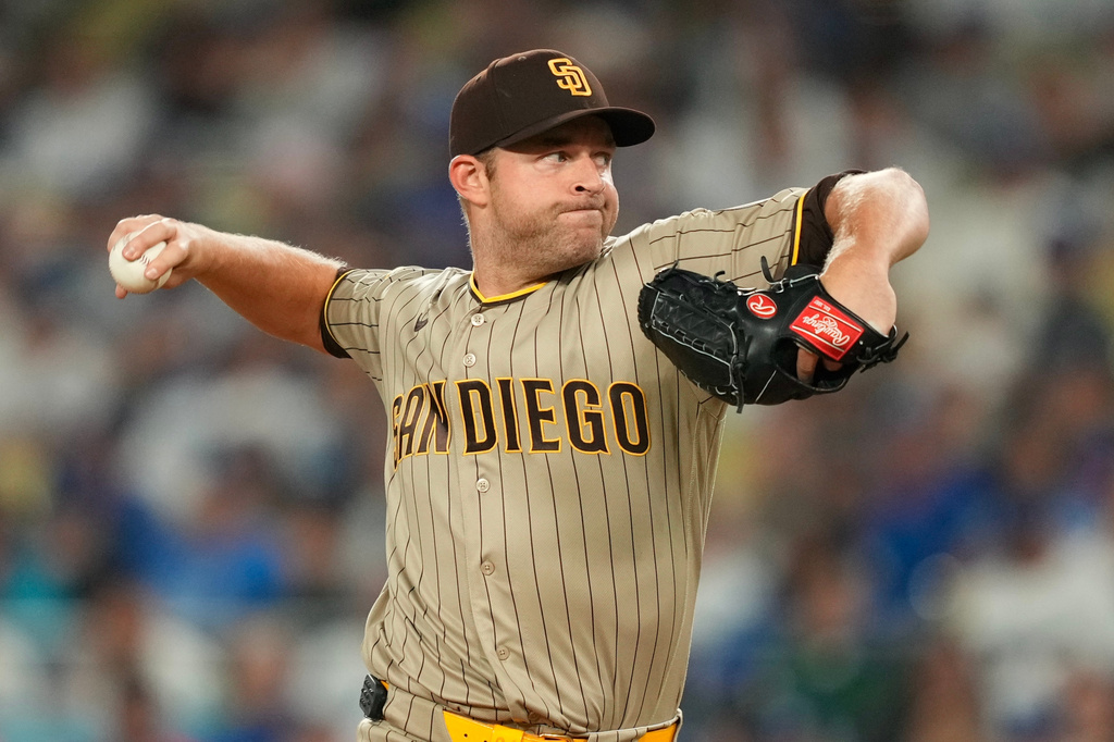 San Diego Padres starting pitcher Michael King throws to the plate during the first inning of a baseball game against the Los Angeles Dodgers, Tuesday, Sept. 22, 2026, in Los Angeles. (AP Photo/Mark J. Terrill)