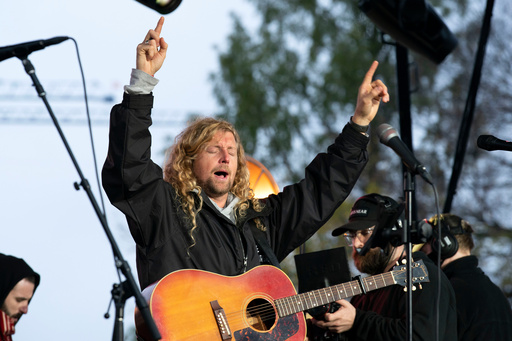 FILE - Christian musician Sean Feucht of California sings to the crowd during a rally at the National Mall in Washington, Sunday, Oct. 25, 2020. (AP Photo/Jose Luis Magana, file) FILE - Christian musician Sean Feucht of California sings to the crowd during a rally at the National Mall in Washington, Sunday, Oct. 25, 2020. (AP Photo/Jose Luis Magana, file)