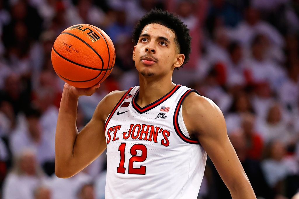 FILE - St. John's guard RJ Luis Jr. (12) holds the ball during the second half of an NCAA college basketball game against Seton Hall, March 1, 2025, in New York. (AP Photo/Noah K. Murray, File)