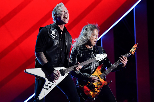 ILE - James Hetfield, left, and Kirk Hammett of Metallica perform during the Global Citizen Festival on Saturday, Sept. 24, 2022, at Central Park in New York. Metallica's latest album, "72 Seasons," releases Friday. (Photo by Evan Agostini/Invision/AP, File) ILE - James Hetfield, left, and Kirk Hammett of Metallica perform during the Global Citizen Festival on Saturday, Sept. 24, 2022, at Central Park in New York. Metallica's latest album, "72 Seasons," releases Friday. (Photo by Evan Agostini/Invision/AP, File)