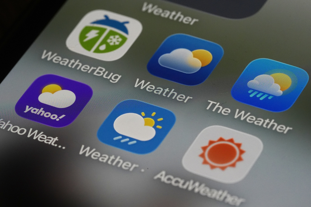 This photo shows various weather apps arranged on a smartphone in Glenside, Pa., Thursday, Jan. 22, 2026. (AP Photo/Matt Rourke)