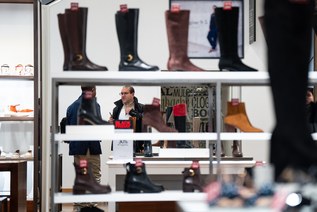 Black Friday Shoppers browse products at Macy's flagship store in New York on Friday, Nov. 28, 2025. (AP Photo/Angelina Katsanis)
