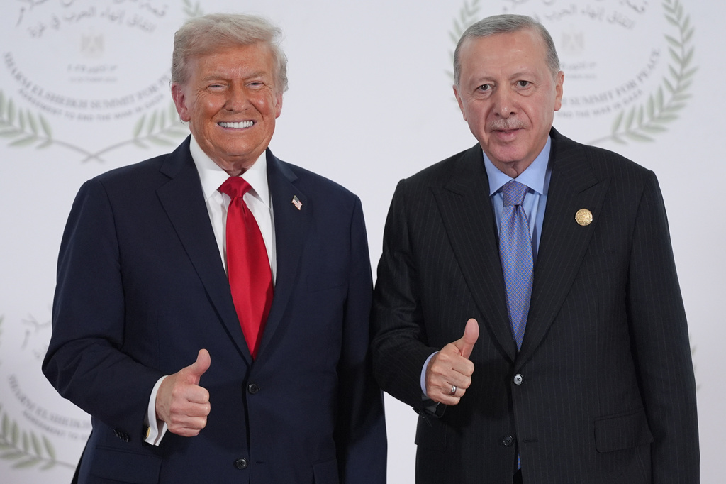FILE - President Donald Trump greets Turkey's President Recep Tayyip Erdogan during a summit, Oct. 13, 2025, in Sharm El Sheikh, Egypt. (AP Photo/Evan Vucci, Pool, File)