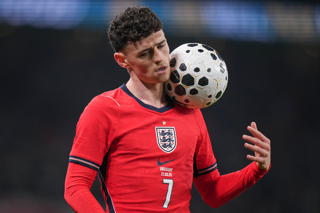 England's Phil Foden holds the ball during the international friendly soccer match between England and Uruguay in London, Friday, March 27, 2026. (AP Photo/Alastair Grant)