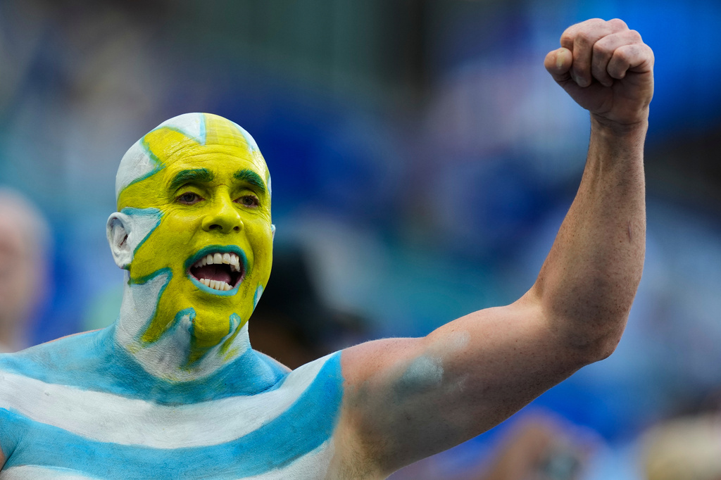 An Uruguay fan cheers ahead of the World Cup Group H soccer match between Uruguay and Cape Verde in Miami Gardens, Fla., Sunday, June 21, 2026. (AP Photo/Rebecca Blackwell)