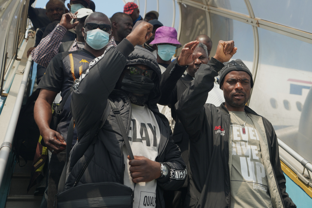 Nigerian nationals repatriated from South Africa, following concerns about unrest, reacts upon arrival at the Murtala Muhammed International Airport in Lagos, Nigeria, Thursday, June 11, 2026. (AP Photo/Sunday Alamba)