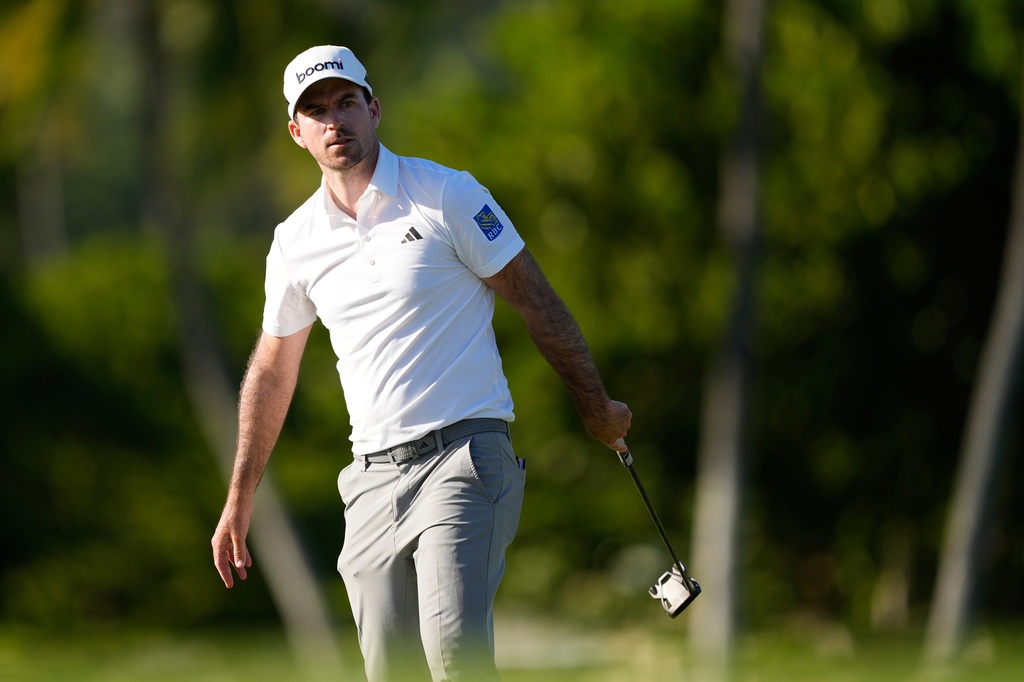 Nick Taylor, of Canada, hits on the 13th hole during the second round of the Sony Open golf event at the Waialae Country Club in Honolulu, Friday, Jan. 16, 2026. (AP Photo/Matt York)