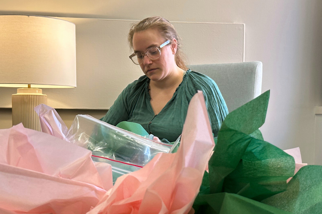 Joelle Haley crochets at the Children's Hospital of Michigan Neonatal Intensive Care Unit at DMC Hutzel Women's Hospital in Detroit, Thursday, Feb. 26, 2026. (AP Photo/Corey Williams)