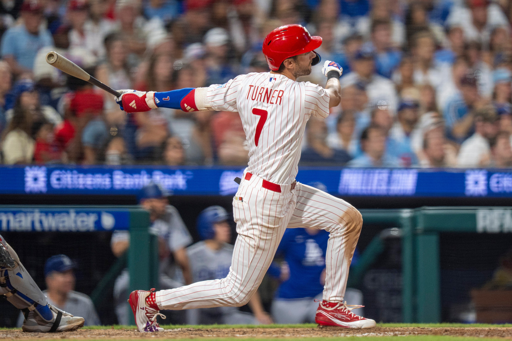 Philadelphia Phillies' Trea Turner hits a three-run home run during the sixth inning of a baseball game against the Los Angeles Dodgers, Monday, July 20, 2026, in Philadelphia. (AP Photo/Chris Szagola)