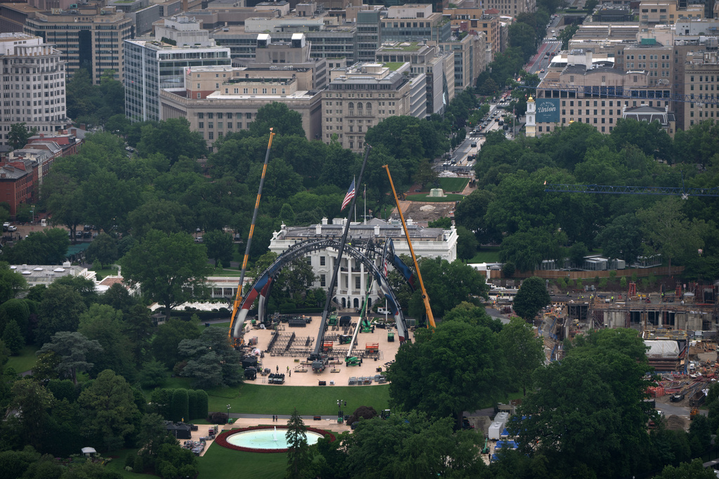 Equipment is seen being placed on the South Lawn of the White House, Tuesday, May 26, 2026, in Washington for a future UFC mixed martial arts fight to be held on June 14 as part of America 250 celebrations. (AP Photo/Mark Schiefelbein)
