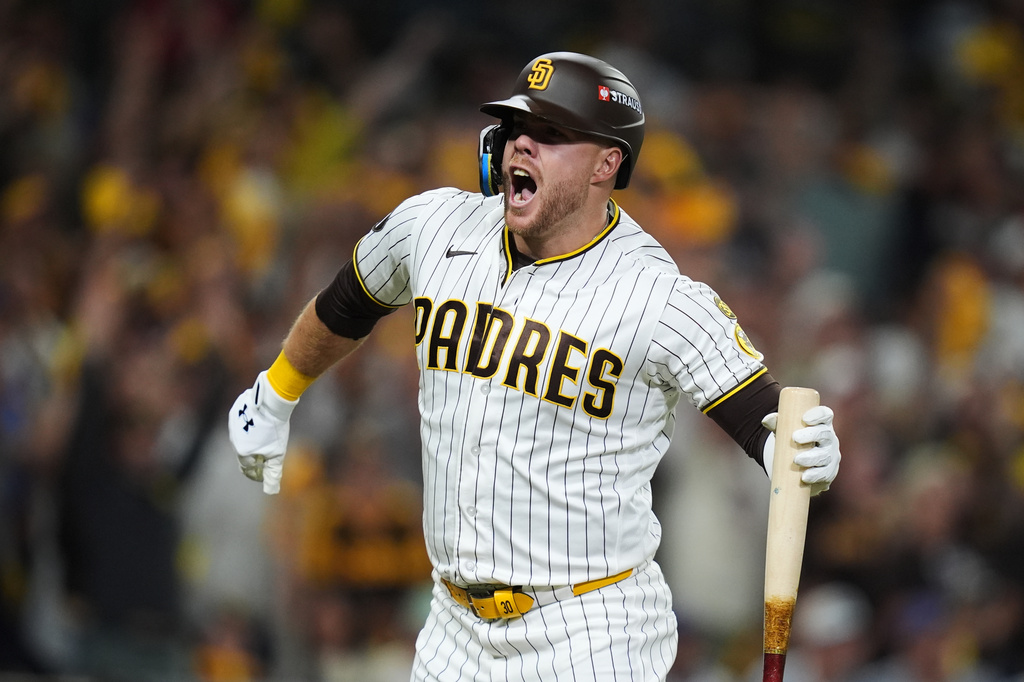 San Diego Padres Gavin Sheets celebrates his two-run home run against the Chicago Cubs in the fourth inning of Game 2 of the National League Wild Card baseball playoff series Wednesday, Sept. 30, 2026, in San Diego. (AP Photo/Gregory Bull)