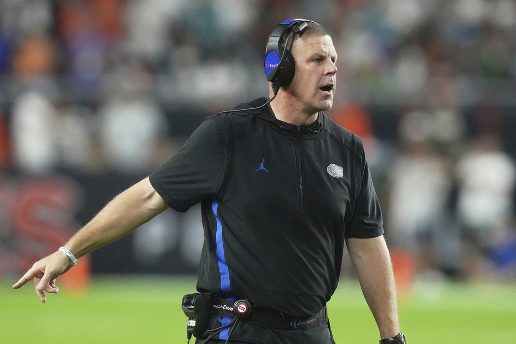 Florida head coach Billy Napier gestures during the second half of an NCAA college football game against Miami, Saturday, Sept. 20, 2025, in Miami Gardens, Fla. (AP Photo/Marta Lavandier)
