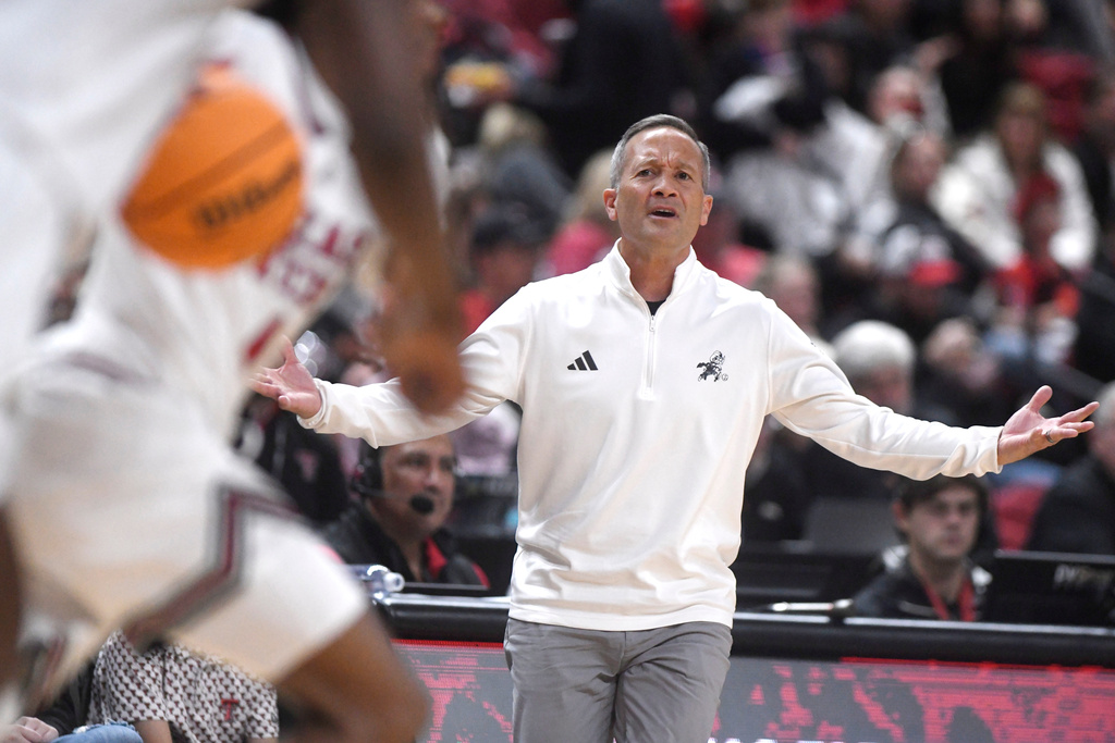 Texas Tech head coach Grant McCasland gestures during the first half in an NCAA college basketball game against New Orleans, Wednesday, Nov. 26, 2025, in Lubbock, Texas. (AP Photo/Annie Rice)