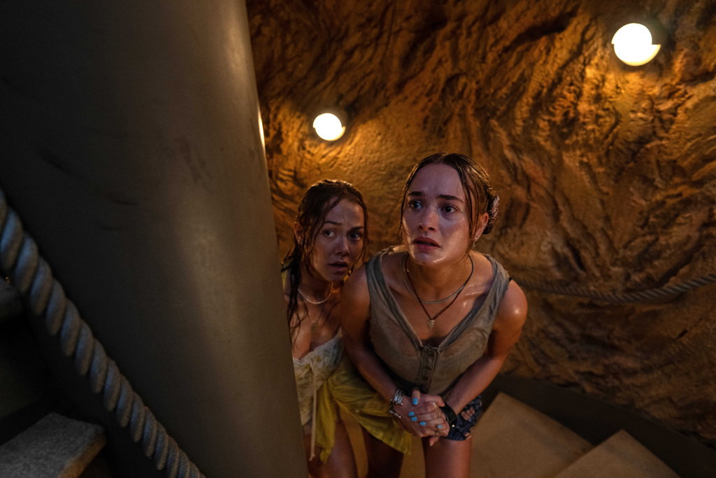 This image released by Paramount Pictures shows Victoria Wyant, left, and Johnny Sequoyah in a scene from "Primate." (Des Willie/Paramount Pictures via AP)