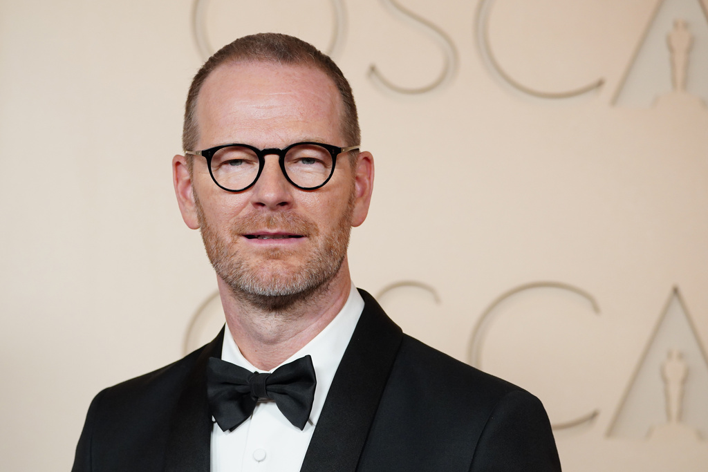 Joachim Trier arrives at the Oscars on Sunday, March 15, 2026, at the Dolby Theatre in Los Angeles. (Photo by Jordan Strauss/Invision/AP)