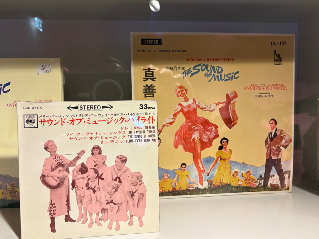 In this photo taken with a smartphone, records with the film score of the musical film "The Sound of Music" are displayed in the exhibition of the new "Sound Of Music Salzburg" museum in Salzburg, Austria, Sunday, Sept. 20, 2026. (AP Photo/Philipp-Moritz Jenne)