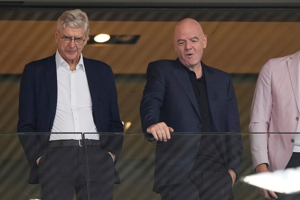 FILE - FIFA president Gianni Infantino, right, and Arsene Wenger, Chief Officer (FIFA) and former soccer coach arrive for the Women's Euro 2025 quarterfinals soccer match between Sweden and England at Stadion Letzigrund in Zurich, Switzerland, Thursday, July 17, 2025. (AP Photo/Martin Meissner, File)