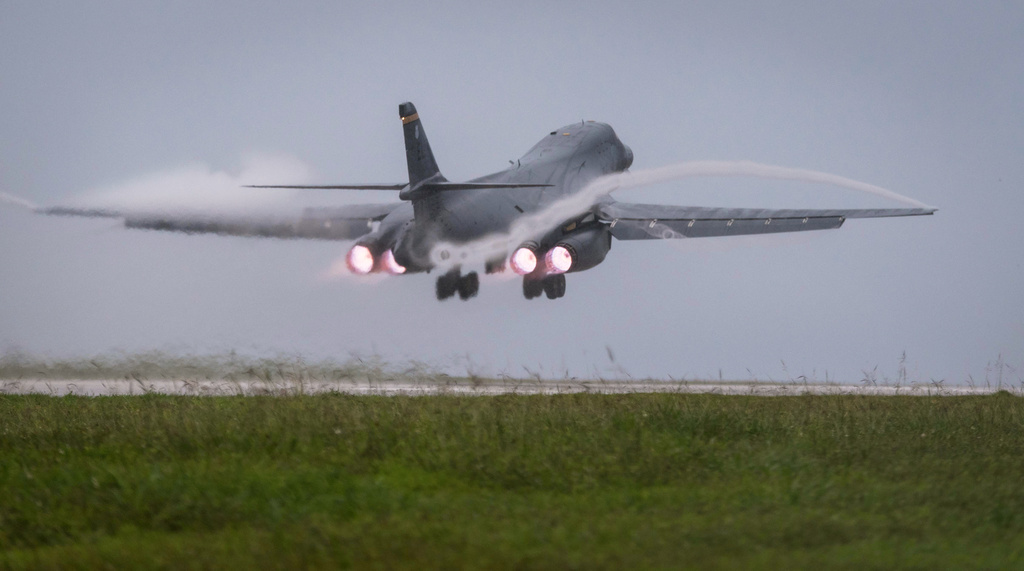 FILE - In this photo released by the U.S. Air Force, a Air Force B-1B Lancer bomber takes off from Andersen Air Force Base, Guam, to fly a mission with two Koku Jieitai (Japan Air Self-Defense Force) F-15s, Sept. 9, 2017. (Senior Airman Jacob Skovo/U.S. Air Force via AP)