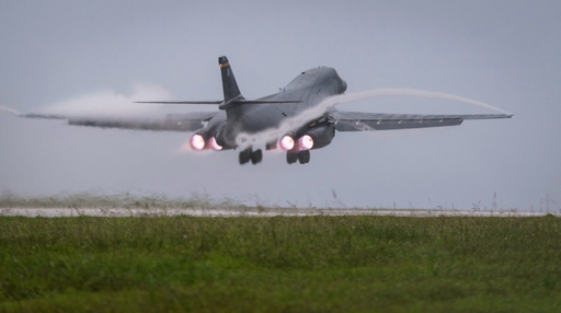 FILE - In this photo released by the U.S. Air Force, a Air Force B-1B Lancer bomber takes off from Andersen Air Force Base, Guam, to fly a mission with two Koku Jieitai (Japan Air Self-Defense Force) F-15s, Sept. 9, 2017. (Senior Airman Jacob Skovo/U.S. Air Force via AP) FILE - In this photo released by the U.S. Air Force, a Air Force B-1B Lancer bomber takes off from Andersen Air Force Base, Guam, to fly a mission with two Koku Jieitai (Japan Air Self-Defense Force) F-15s, Sept. 9, 2017. (Senior Airman Jacob Skovo/U.S. Air Force via AP)