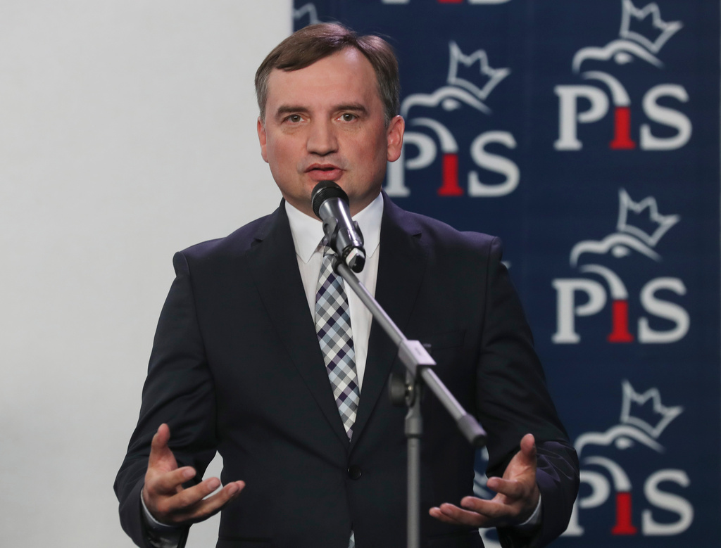 FILE - The leader of the Polish junior coalition partners Zbigniew Ziobro, speaks to reporters alongside in Warsaw, Poland, Saturday, Sept. 26, 2020. (AP Photo/Czarek Sokolowski, file)