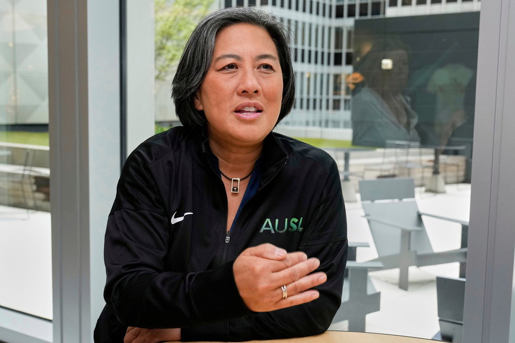 FILE - Athletes Unlimited Softball League Commissioner Kim Ng, a former Major League Baseball executive, is interviewed at Major League Baseball's headquarters in New York, May 29, 2025. (AP Photo/Richard Drew, File)