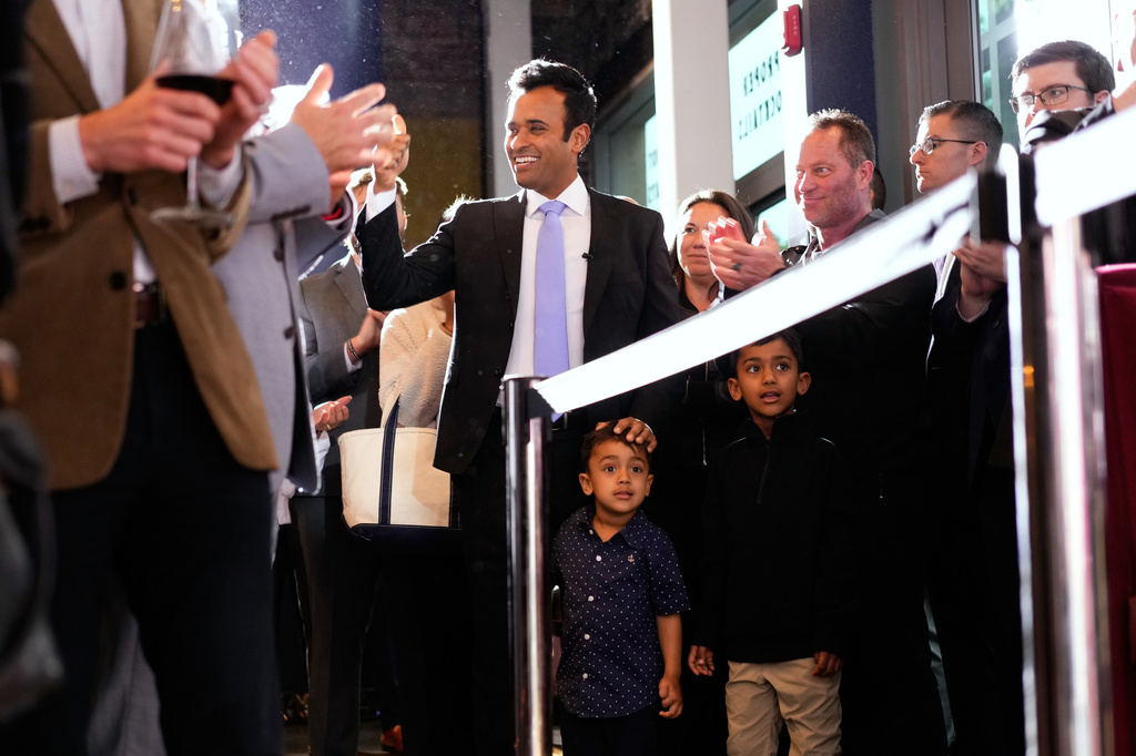 Republican Ohio gubernatorial candidate Vivek, alongside sons Karthik and Arjun, greets supporters during a watch party at the Spruce St. Sporting sports bar after winning the party's nomination for governor Tuesday, May 5, 2026, in Columbus. (AP Photo/Carolyn Kaster)