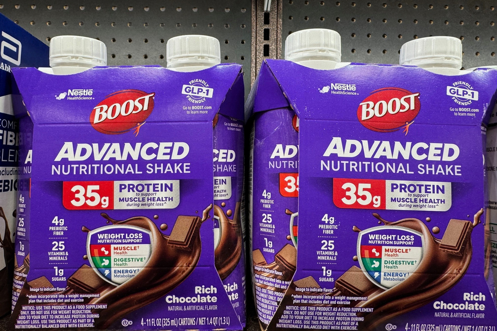 Nutritional shakes with "GLP-1 Friendly" labels sit on the shelf of a Kroger grocery store Tuesday, Jan. 13, 2026, in Ann Arbor, Mich. (AP Photo/Dee-Ann Durbin)