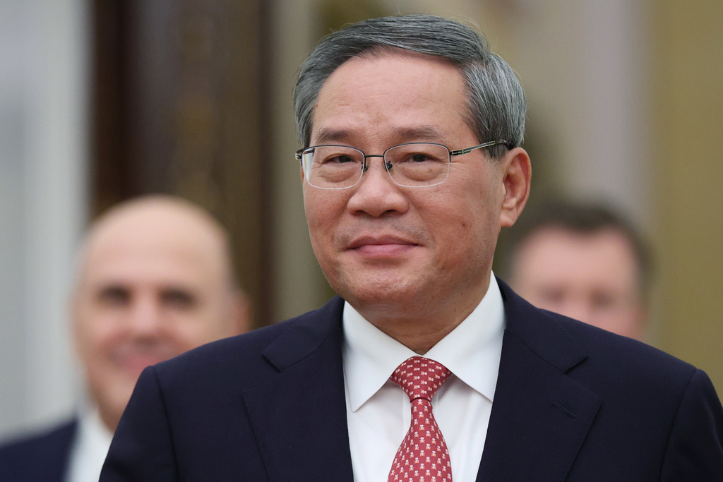 FILE - Chinese Premier Li Qiang enters a hall for his meeting with Russian President Vladimir Putin at the Senate Palace of the Kremlin in Moscow, Russia, on Nov. 18, 2025. (Ramil Sitdikov/Pool Photo via AP, File)
