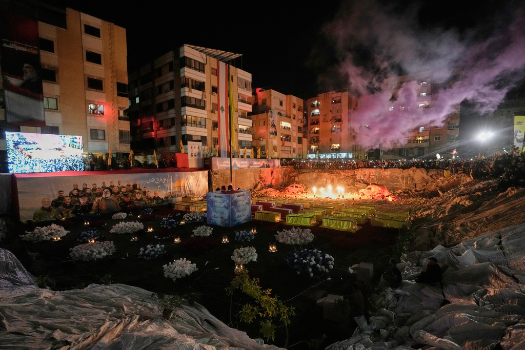 People gather at the site where Hezbollah leader Hassan Nasrallah was killed in Israeli airstrikes on Sept. 27, 2024, a day before the first anniversary of his death, in the Haret Hreik suburb south of Beirut, Lebanon, Friday, April 26, 2025. (AP Photo/Hassan Ammar)