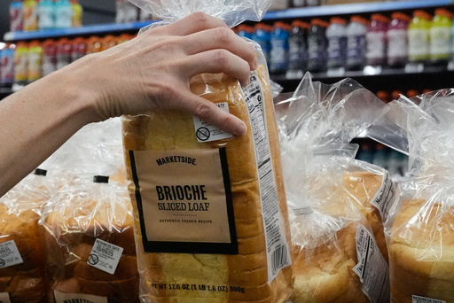 A customer reaches for a loaf of Marketside brand bread at a Walmart Neighborhood Market, Friday, Sept. 26, 2025, in Bentonville, Ark. (AP Photo/Charlie Riedel) A customer reaches for a loaf of Marketside brand bread at a Walmart Neighborhood Market, Friday, Sept. 26, 2025, in Bentonville, Ark. (AP Photo/Charlie Riedel)