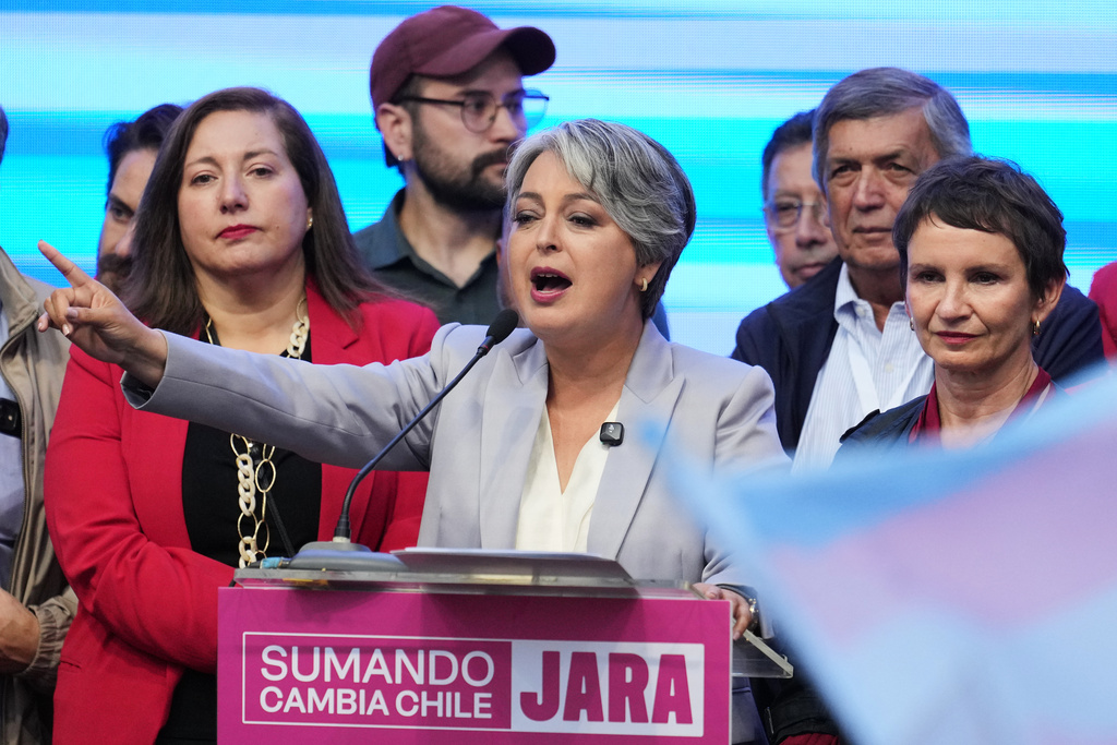 Presidential candidate Jeannette Jara, of the ruling Unity for Chile coalition, concedes to Jose Antonio Kast, of the opposition Republican Party, in the presidential runoff election in Santiago, Chile, Sunday, Dec. 14, 2025. (AP Photo/Natacha Pisarenko)