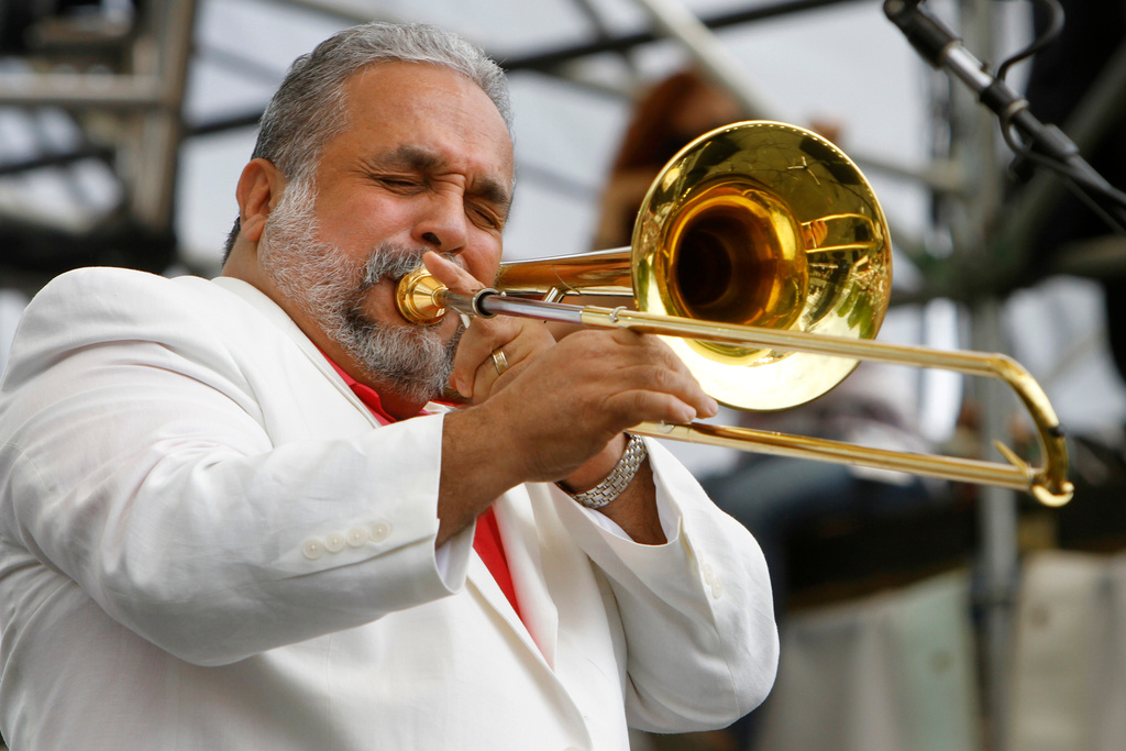 FILE - Singer and musician Willie Colon performs at The Climate Rally, an Earth Day concert, on the National Mall in Washington, April 25, 2010. Colón, considered by many to be the "architect of urban salsa," died Saturday, Feb. 21, 2026. He was 75. (AP Photo/Jacquelyn Martin, File)